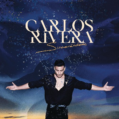 Carlos Rivera – ALGUIEN ME ESPERA EN MADRID Lyrics (feat Eden Muñoz & Carin Leon)